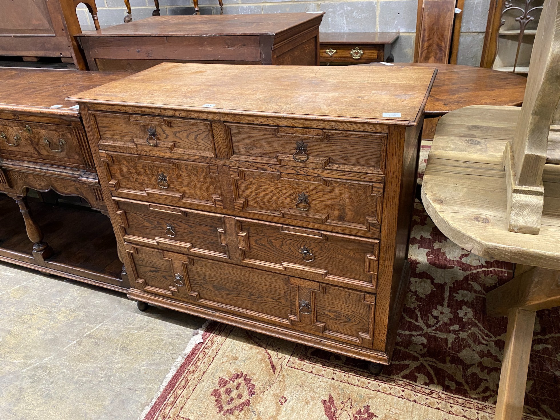 A 18th century style geometric oak chest, width 104cm, depth 51cm, height 89cm